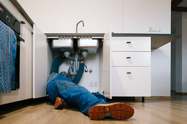 Professional Plumbing technician working in Newton Center, MA
